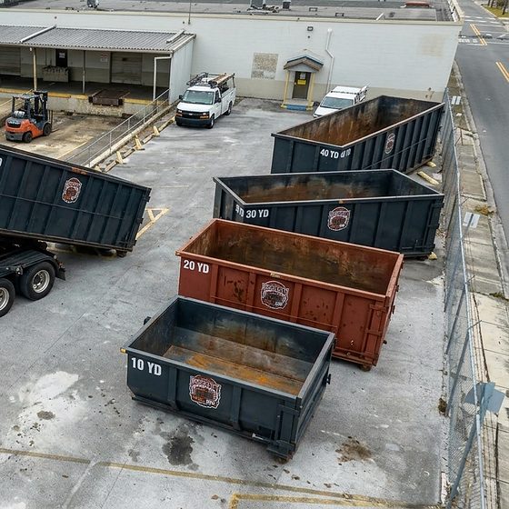 BrickCity Roll Off 10, 20, 30 and 40-yard roll-off containers and a roll-off truck in the company yard