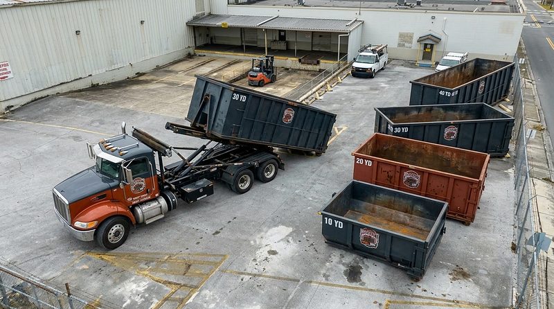 BrickCity Roll Off roll-off containers and truck in the company yard